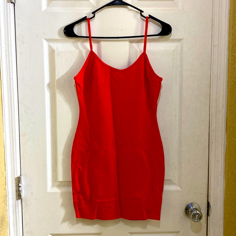 Women’s mini spaghetti strap dress from Laura’s Boutique.